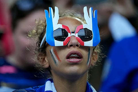 France fan cheers for the team